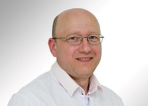 Trofim Schmidt, Mag. Phys. (RU) Portraitfoto von Trofim Schmidt, Medizinphysiker in der Abteilung Medizinische Physik und Strahlenschutz